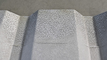 Das Bild zeigt ein deaktiviertes Vlies, was am Rand des Trapezbleches verödet wurde.